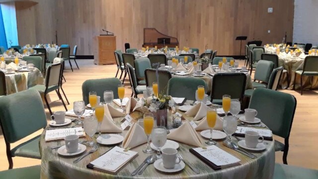 Tykeson Rehearsal hall set up for a dinner